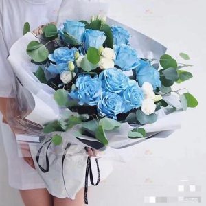 You are a treasure (10 icy blue roses, white lisianthus, eucalyptus)